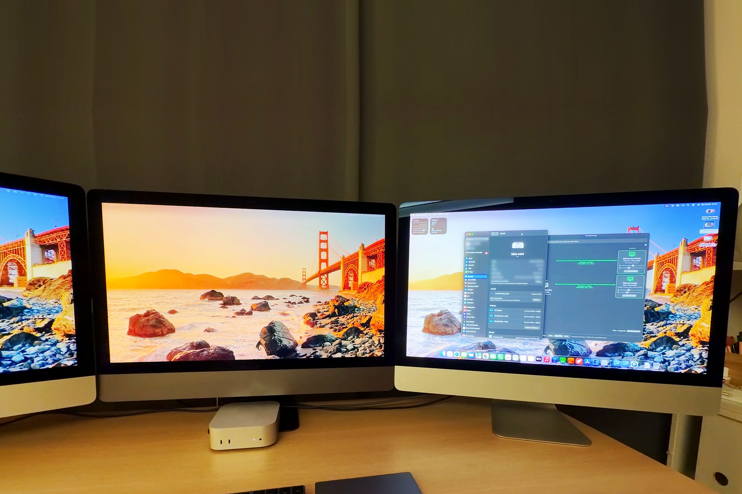 A Mac mini on a desk under three 27-inch iMacs that work as its displays, with the DisplayBridge window open on the right one.