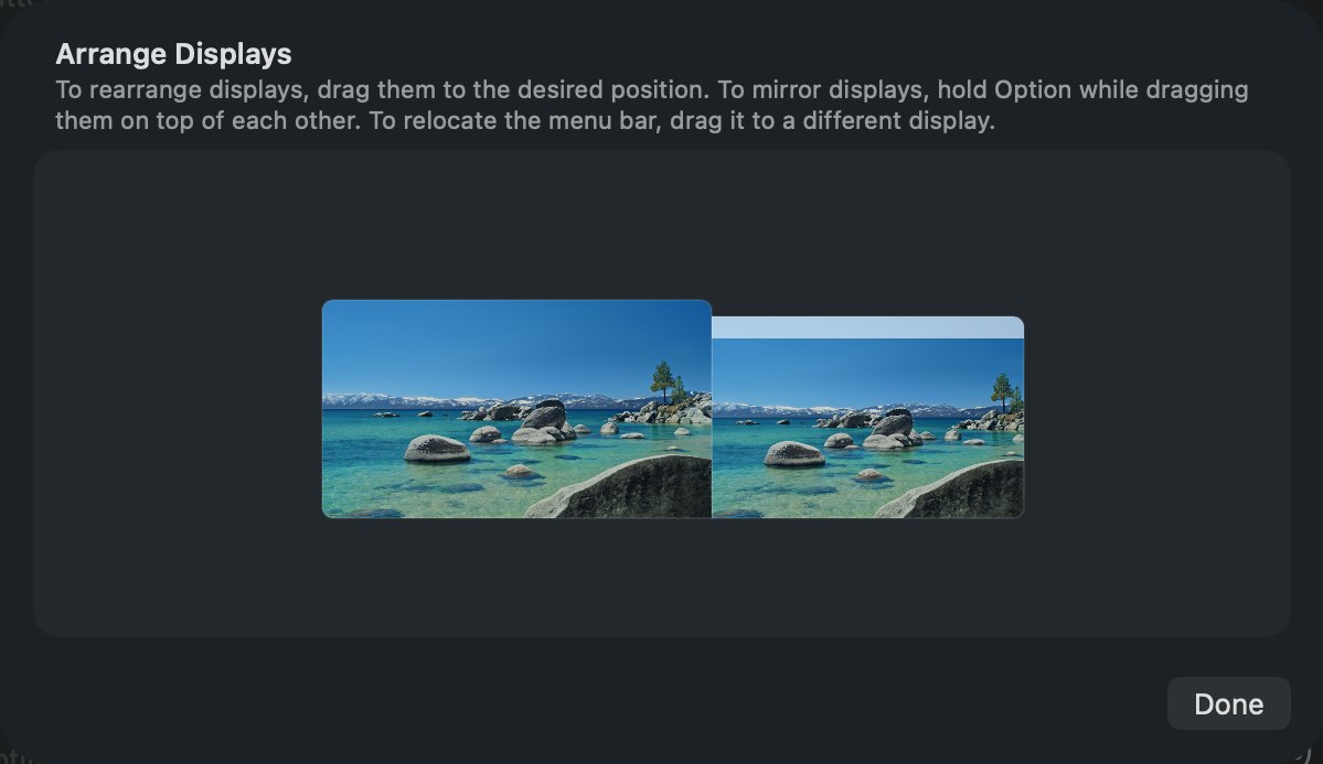 The Arrange Displays sheet in System Settings: two display rectangles side by side, the larger iMac on the left and the MacBook on the right, with a Done button.